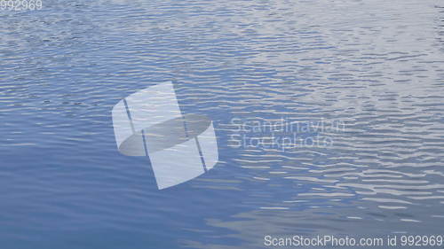 Image of Calm And Gentle Waves On The Surface Of The Ocean.