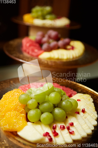 Image of Plate with mixed fruits. Shallow dof.