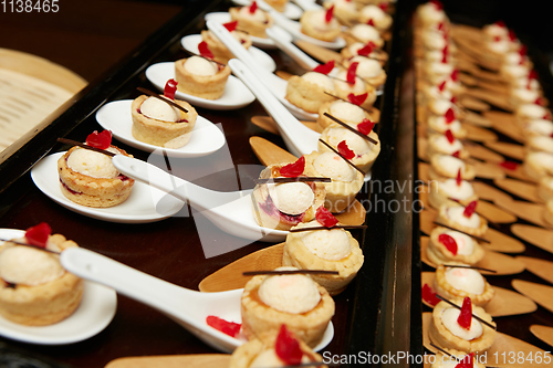 Image of Canapes with dessert on the banquet table.