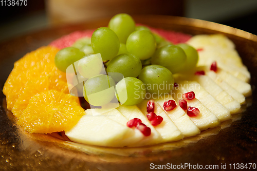 Image of Plate with mixed fruits. Shallow dof.