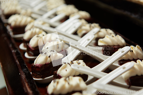 Image of Canapes with dessert on the banquet table.