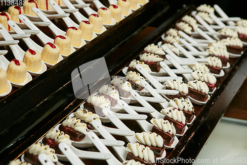 Image of Canapes with dessert on the banquet table.