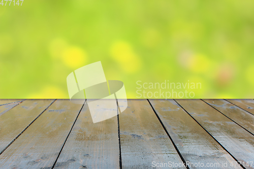 Image of table from wooden boards with natural background