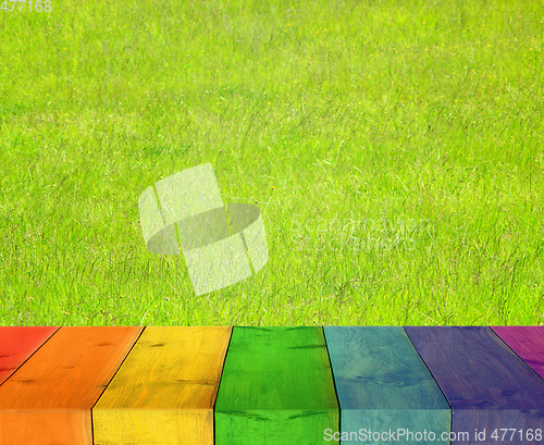 Image of table from multicolored wooden boards