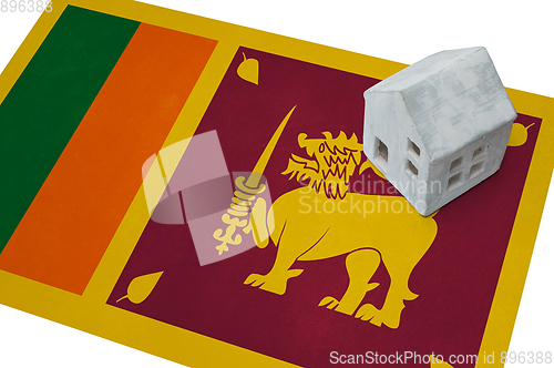 Image of Small house on a flag - Sri Lanka