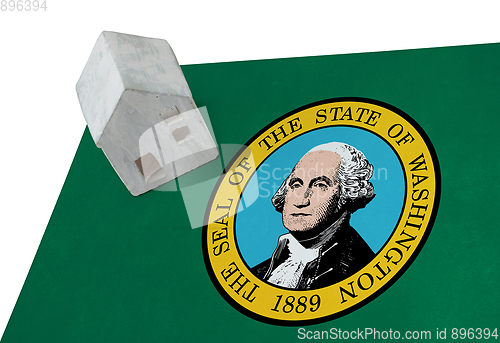 Image of Small house on a flag - Washington
