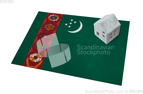 Image of Small house on a flag - Turkmenistan