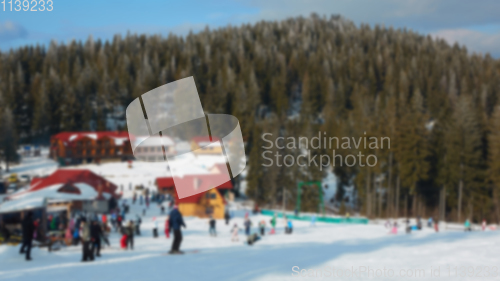 Image of Blur panoramic view of sport resort for winter vacation. Skies with back light. Warm filter with original sun color tones