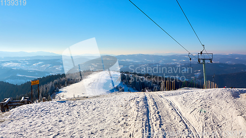 Image of ski resort in early winter, waiting for snow surface lift on a background mountain valley