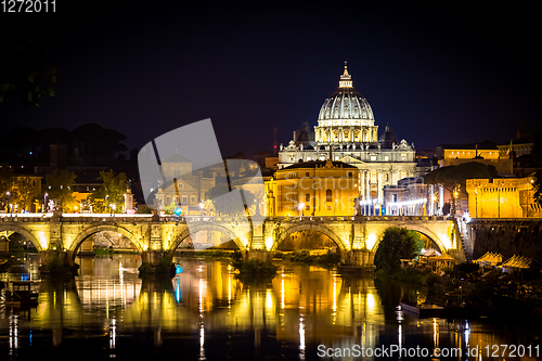 Image of Vatican City: Saint Peter with bridge reflection by night