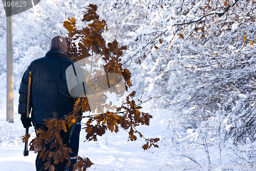 Image of Serbian Christmas tradition collecting oak leaves to light fire