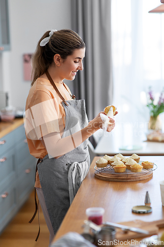 Image of woman cooking food and baking on kitchen at home