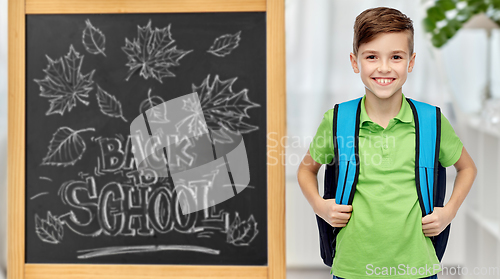 Image of happy student boy with school bag