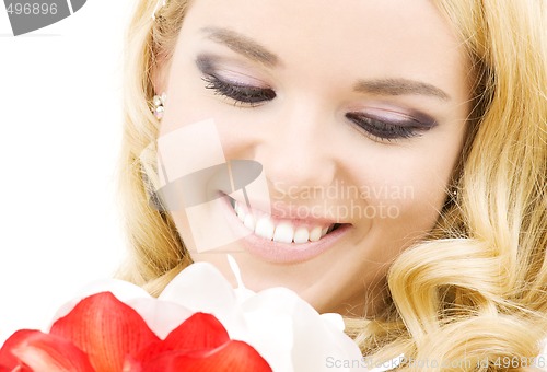 Image of happy woman with lily flowers