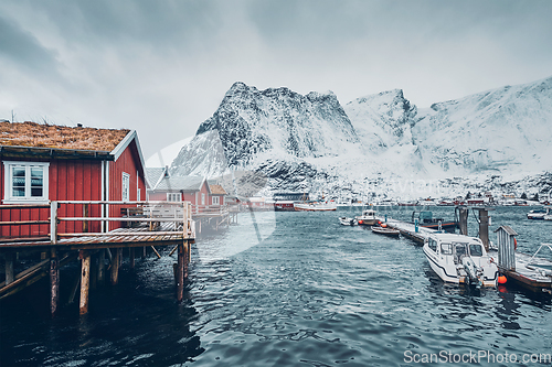 Image of Traditional red rorbu houses in Reine, Norway