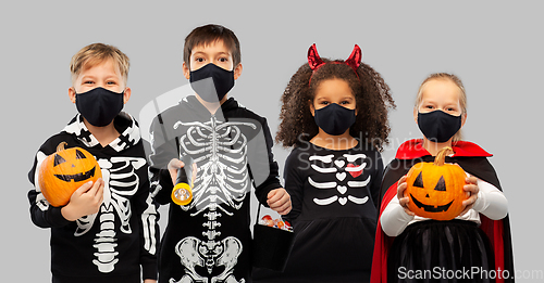 Image of children in halloween costumes and reusable masks