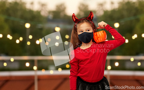 Image of girl in halloween costume and mask