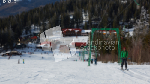 Image of Blur panoramic view of sport resort for winter vacation. Skies with back light. Warm filter with original sun color tones