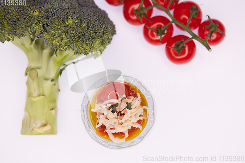 Image of Vegetarian broccoli green soup puree with tomato