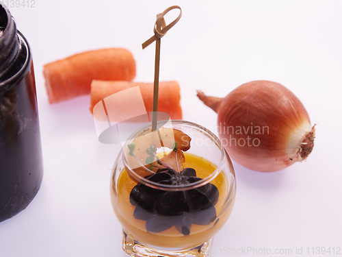 Image of Appetizer in a glass. Shrimp with vegetable puree with cuttlefish ink. Healthy food. Top view