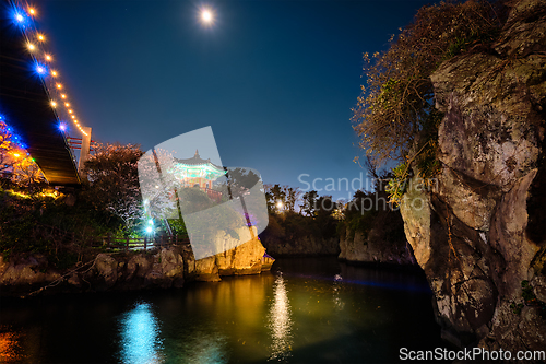 Image of Yongyeon Pond with Yongyeon Pavilion illuminated at night, Jeju islands, South Korea