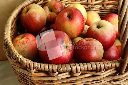 Image of Bright tasty ripe apples in a basket