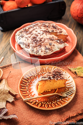 Image of Homemade pumpkin cake with apples and fresh cheese icing