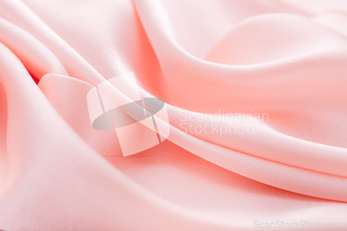 Image of Smooth elegant pink silk or satin texture can use as wedding background. 