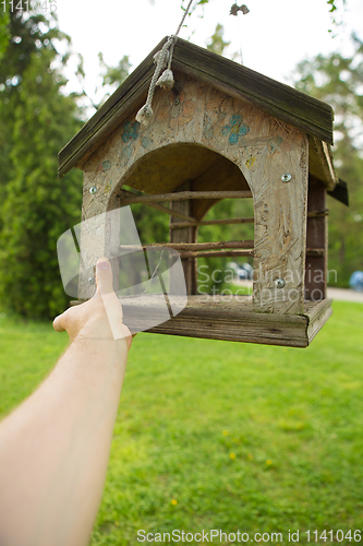 Image of Feeders for birds in the city park