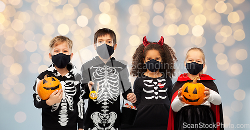 Image of children in halloween costumes and reusable masks