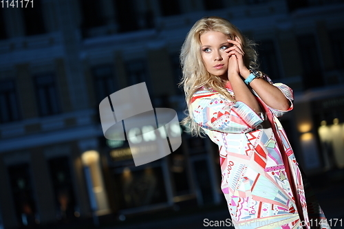 Image of Young Beauty Famous Woman In Red Dress Outdoor