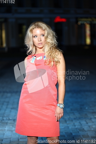 Image of Young Beauty Famous Woman In Red Dress Outdoor