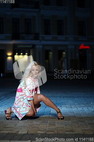 Image of Young Beauty Famous Woman In Red Dress Outdoor