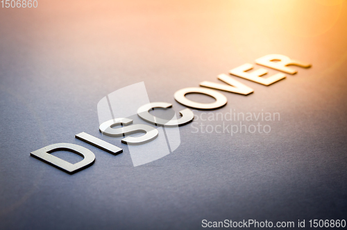 Image of Word discover written with white solid letters