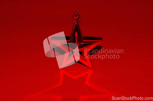 Image of red star christmas bauble