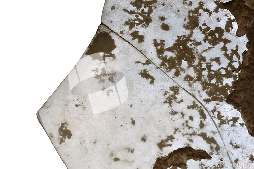 Image of dusty broken glass fragment