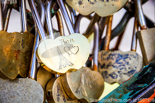 Image of Love Paris Padlocks hanging on a fence