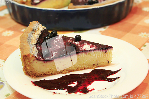Image of Piece of pie with bilberry on the plat
