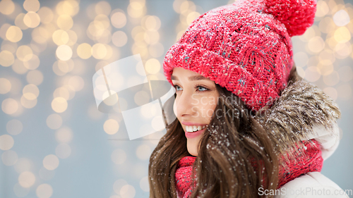 Image of smiling teenage girl outdoors in winter
