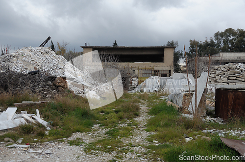 Image of abandoned factory pile of marble