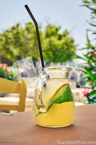 Image of Mohito coctail on cafe table