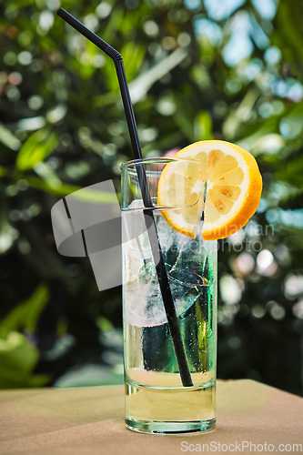 Image of Gin tonic cocktail on cafe table