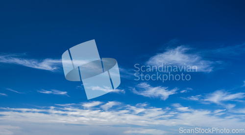 Image of Blue clear sky with clouds