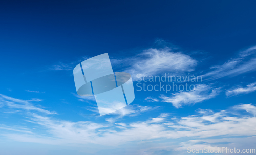 Image of Blue clear sky with clouds