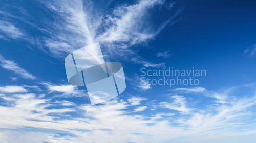 Image of Blue clear sky with clouds