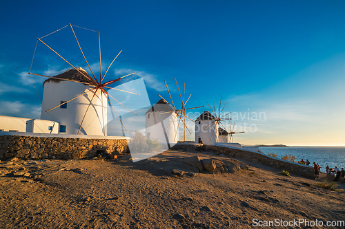 Image of Traditional greek windmills on Mykonos island at sunrise, Cyclades, Greece