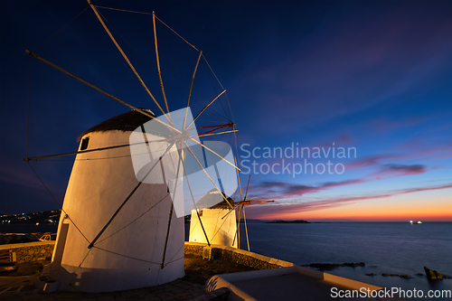 Image of Traditional greek windmills on Mykonos island at sunrise, Cyclades, Greece