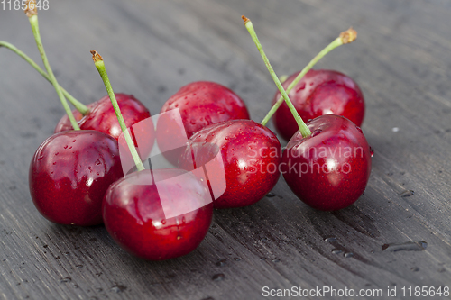 Image of pile of red ripe and juicy cherry