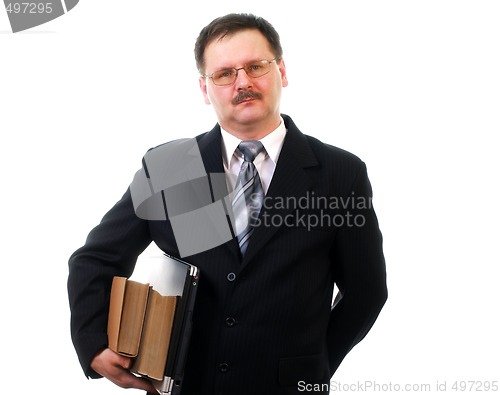 Image of Businessman with laptop and books