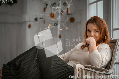 Image of Beauty portrait of finnish scandinavian type caucasian woman sitting on chair